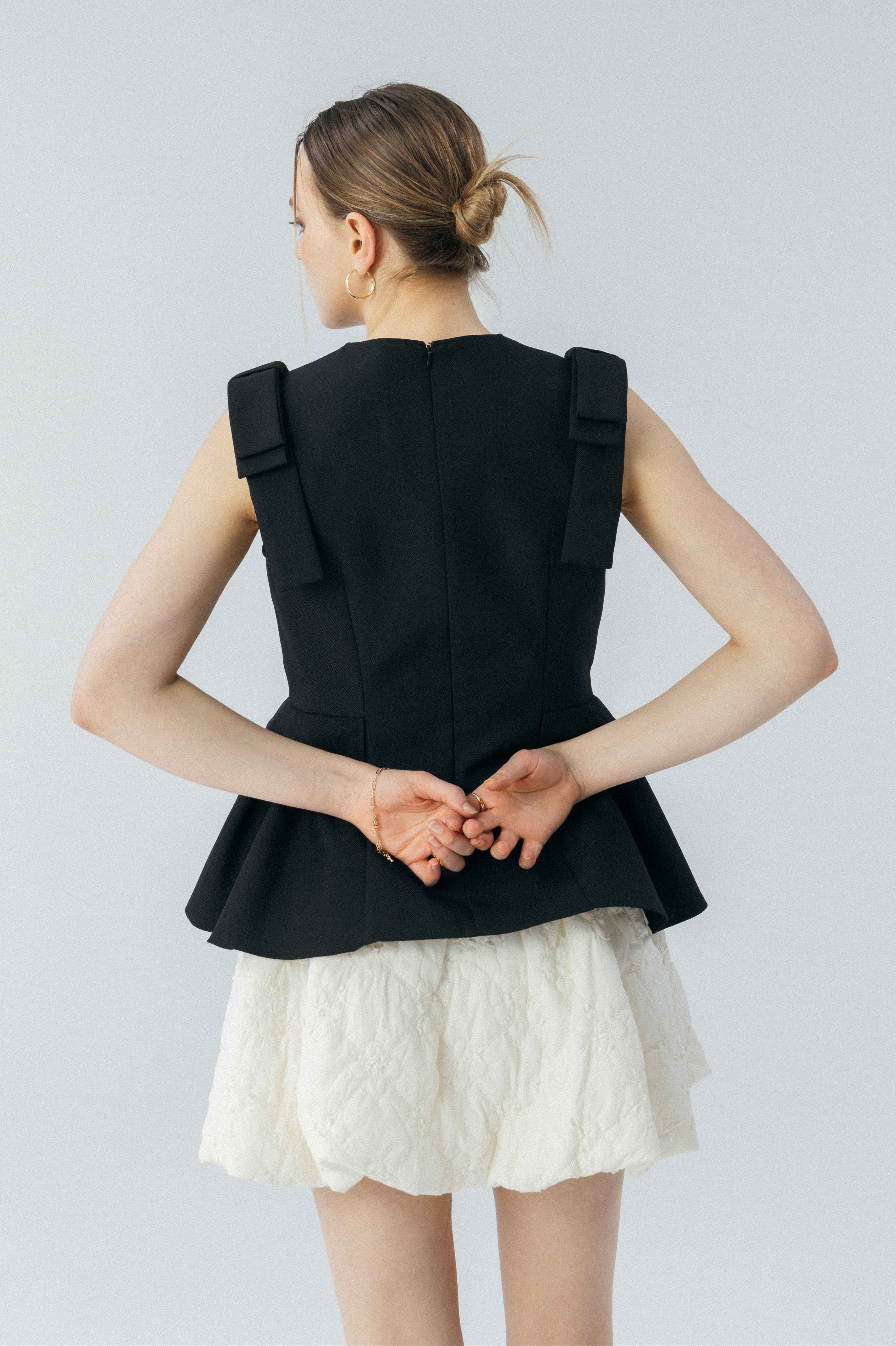 Korinthos Sleeveless Peplum