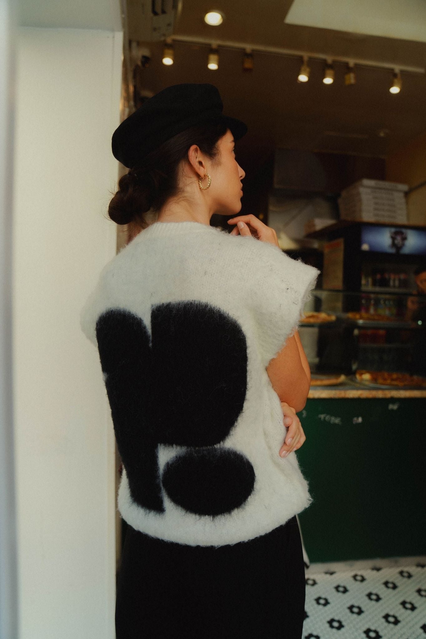 Bourse modern graphic vest