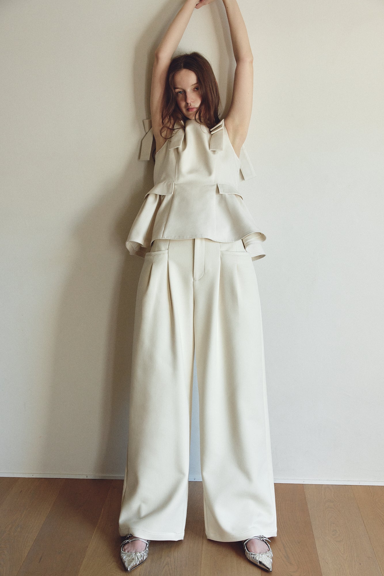 Korinthos Sleeveless Peplum – THE TOÉ