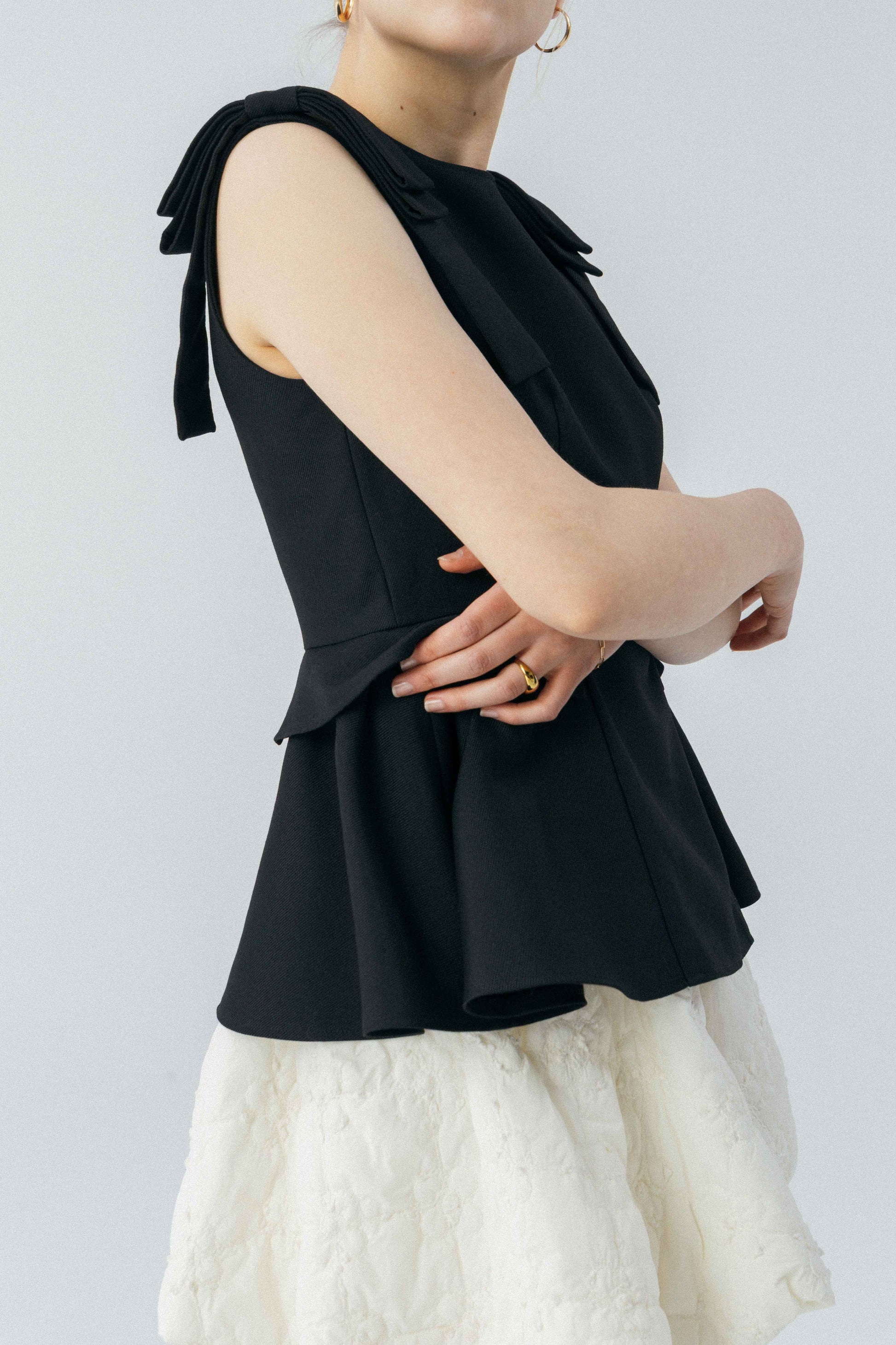 Korinthos Sleeveless Peplum