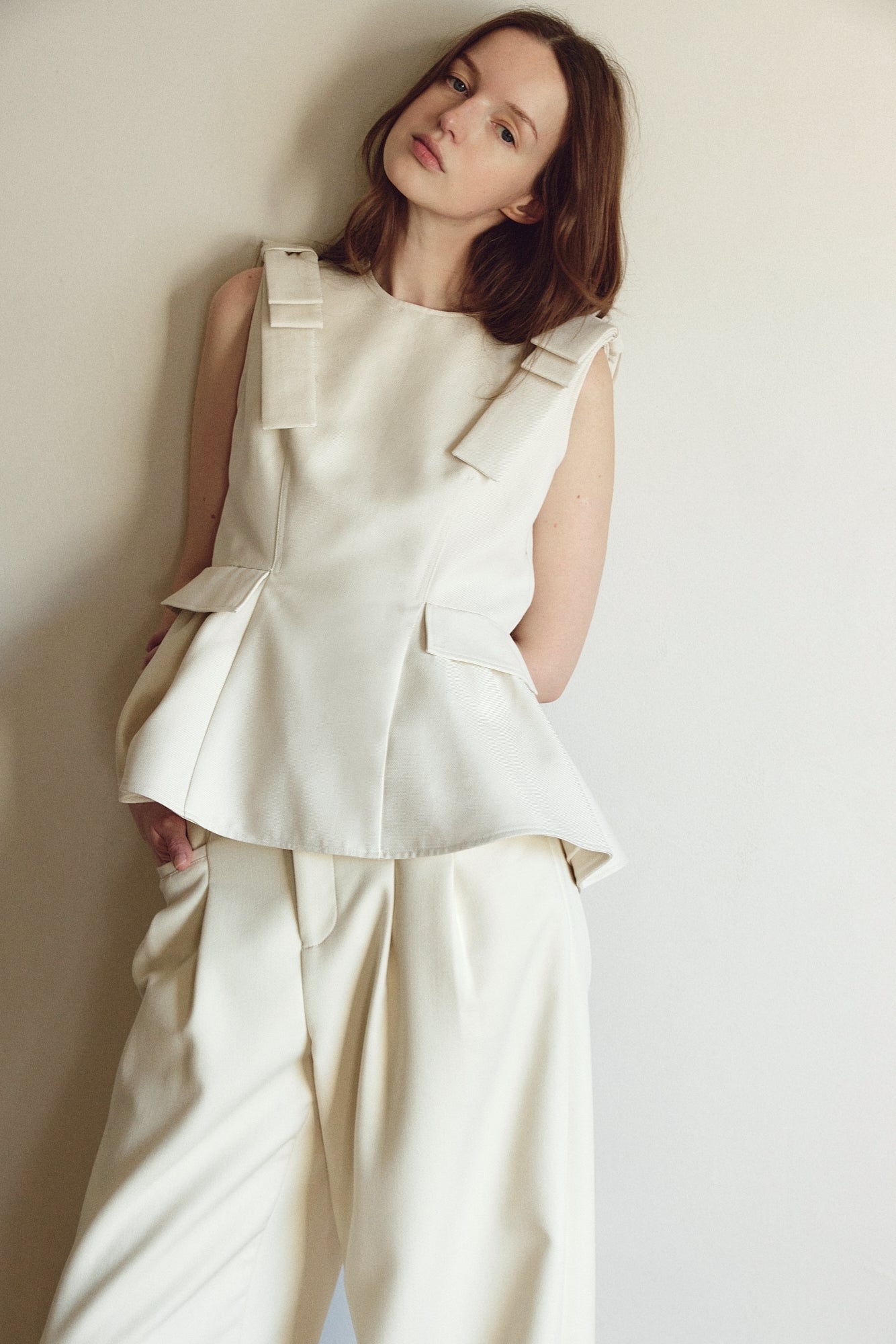 Korinthos Sleeveless Peplum