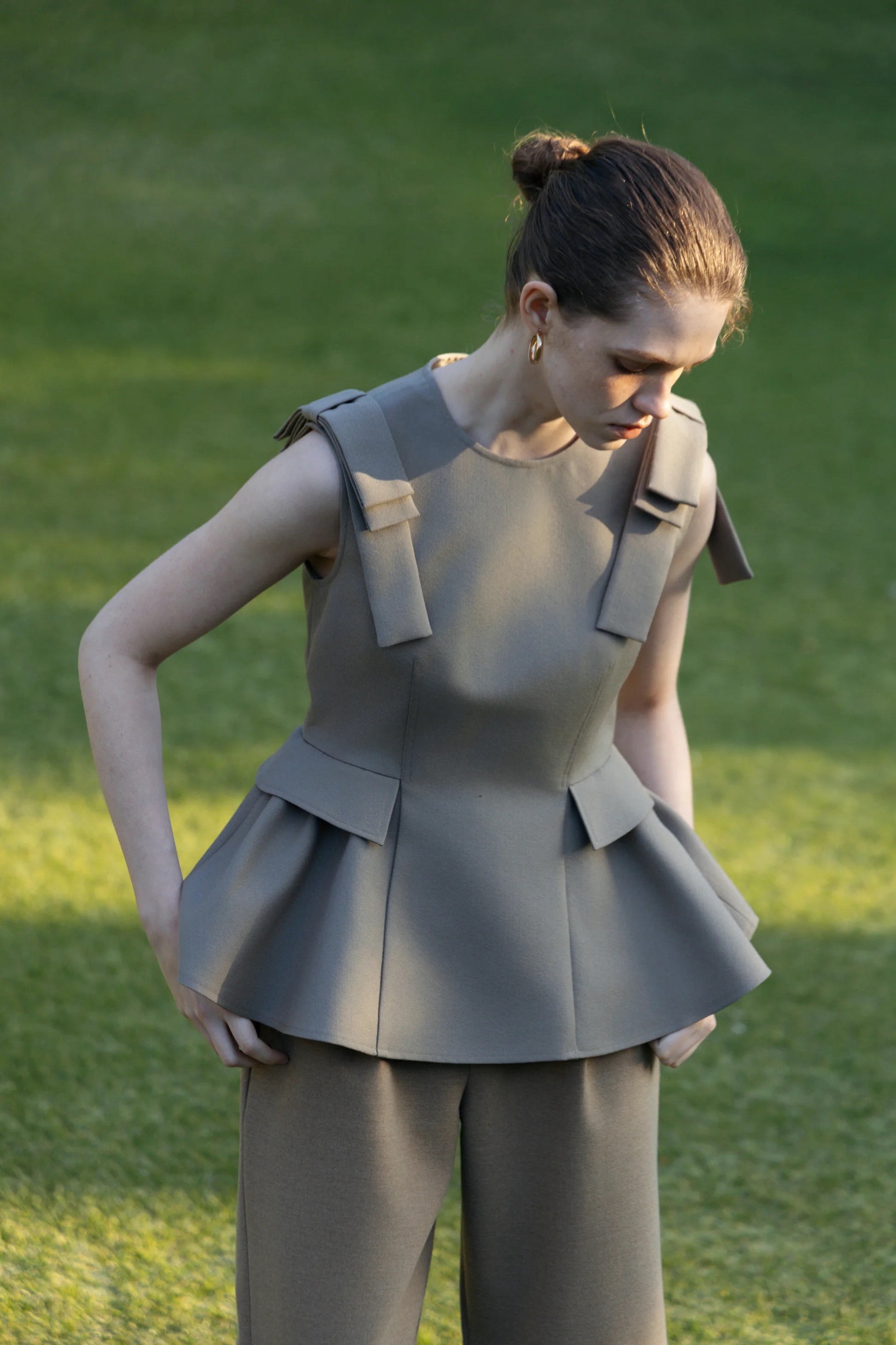 Korinthos Sleeveless Peplum
